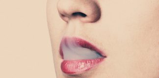 a women smoking a joint