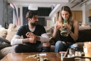 a couple trying Bongs, Bubblers, and Water Pipes